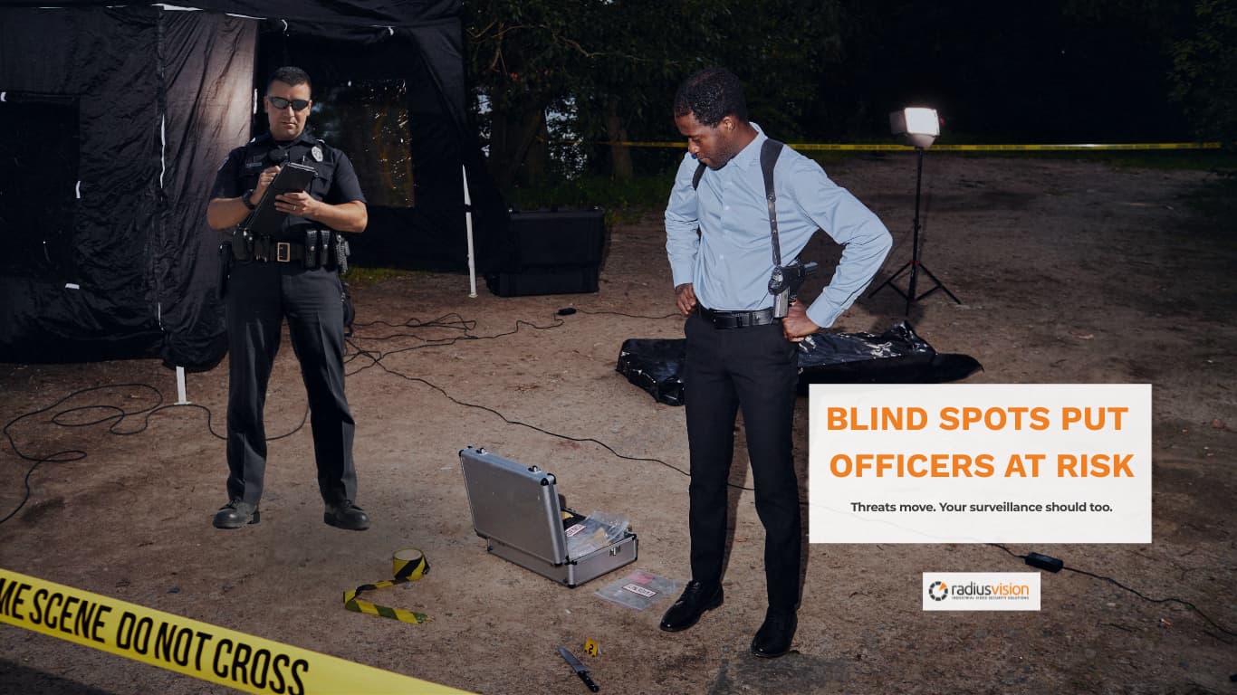 Law enforcement officer surveying an area with surveillance blind spots and coverage gaps